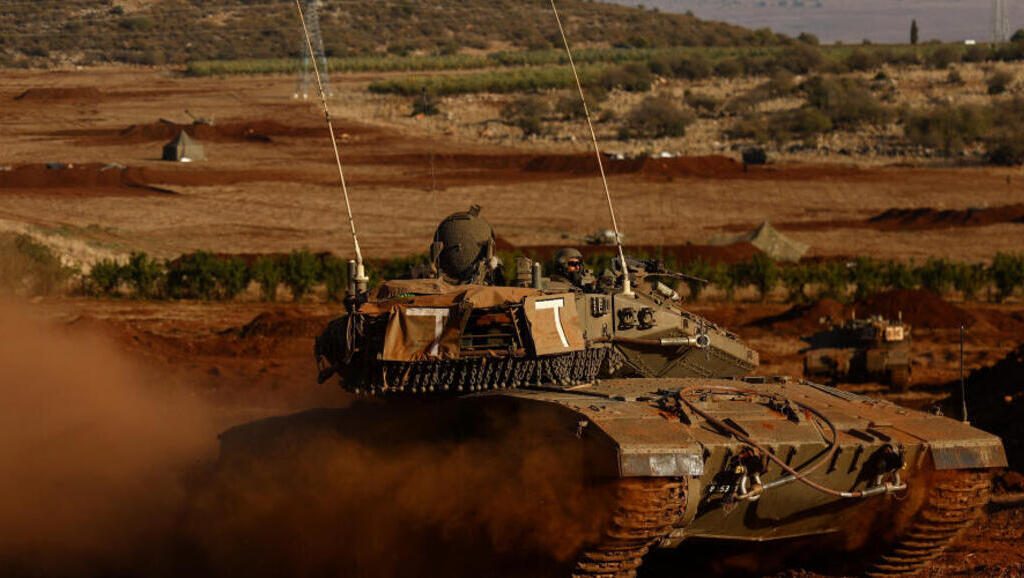 An Israeli tank participates in a military drill near Israel's border with Lebanon in northern Israel, October 26, 2023. REUTERS/Lisi Niesner